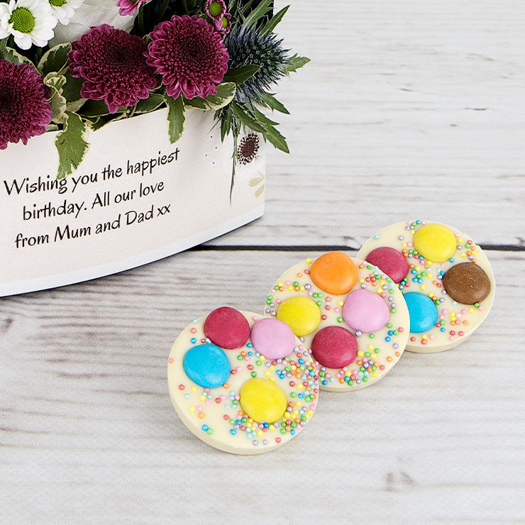 White chocolate spotty discs White chocolate spotty discs